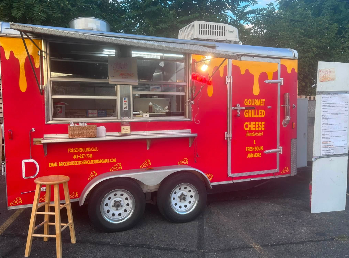 The Cheese Nerds food trailer set up to serve gourmet grilled cheese and fresh soups